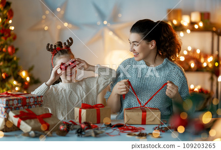 family preparing for Christmas family preparing for Christmas 109203265