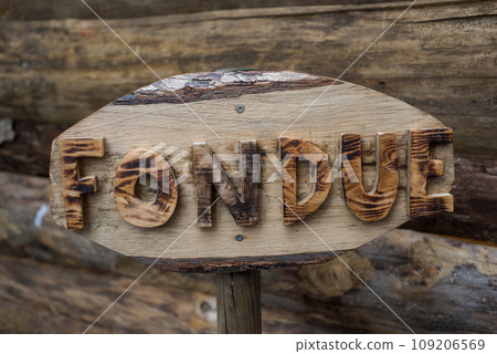 Closeup of fondue sign in french, traduction in english 109206569