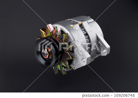 car generator close-up, element of the car power supply system, on a black background,  selective focus 109206748