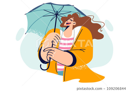 Happy woman with umbrella laughs while walking, enjoying fresh air and warm autumn weather Happy woman with umbrella laughs while walking, enjoying fresh air and warm autumn weather 109206844