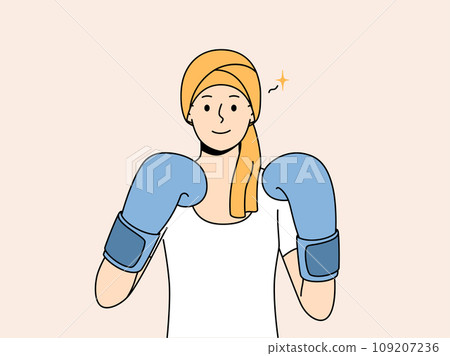 Woman with cancer in boxing gloves symbolizes fight against oncology after chemotherapy 109207236