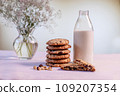 oatmeal cookies with hazelnuts and chocolate chips on the table 109207354