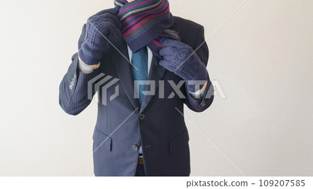 A businessman who winds a muffler A businessman who winds a muffler 109207585