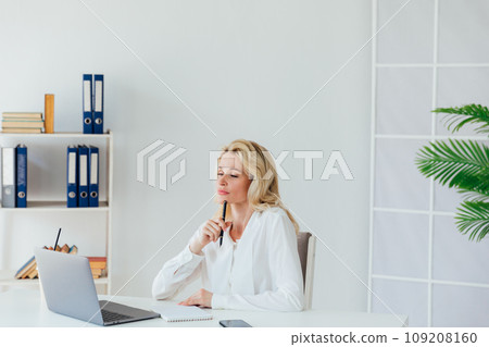 woman secretary working with laptop computer in office woman secretary working with laptop computer in office 109208160