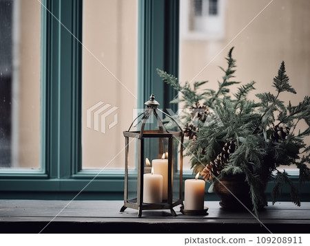 Decorative winter arrangement with fir and candles in cozy home interior, stylish room decor for Christmas holiday season, afternoon daylight Decorative winter arrangement with fir and candles in cozy home interior, stylish room decor for Christmas holiday season, afternoon daylight 109208911