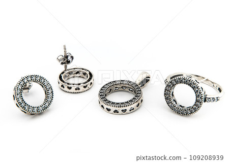 Silver jewels collection with crystals in minimalism style. Silver set of earrings and silver necklace 109208939