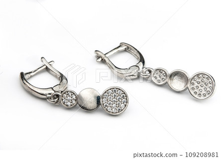 Luxury silver round earrings big jewelry for women isolated on white background, clipping path included 109208981