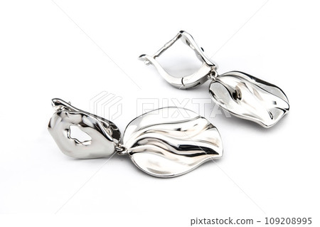 Luxury silver round earrings big jewelry for women isolated on white background, clipping path included Luxury silver round earrings big jewelry for women isolated on white background, clipping path included 109208995