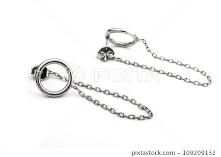 Luxury silver round earrings big jewelry for women isolated on white background, clipping path included Luxury silver round earrings big jewelry for women isolated on white background, clipping path included 109209132