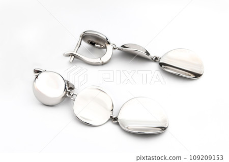 Luxury silver round earrings big jewelry for women isolated on white background, clipping path included 109209153