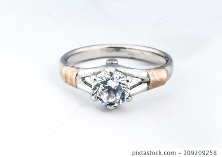 Silver minimalism diamond ring isolated on white background Silver minimalism diamond ring isolated on white background 109209258