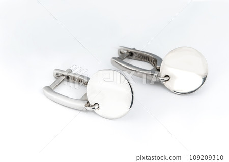 Luxury silver round earrings big jewelry for women isolated on white background, clipping path included 109209310
