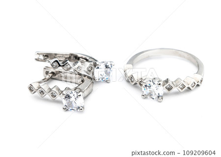 Silver jewels collection with crystals in minimalism style. Silver set of earrings and silver necklace 109209604