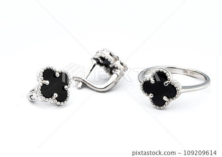 Silver jewels collection with crystals in minimalism style. Silver set of earrings and silver necklace Silver jewels collection with crystals in minimalism style. Silver set of earrings and silver necklace 109209614