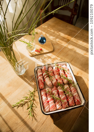 Traditional Christmas dish "Pigs in a blanket" 109210079