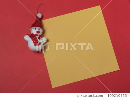 Christmas greeting card with snowman on red background. Merry Christmas and Happy New Year! Christmas greeting card with snowman on red background. Merry Christmas and Happy New Year! 109210353