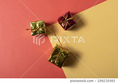 Christmas gift boxes on colorful background. Top view with copy space. 109210365