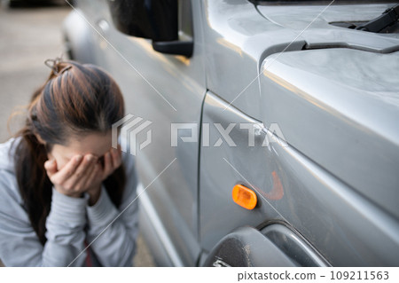 A woman who caused a traffic accident A woman who caused a traffic accident 109211563