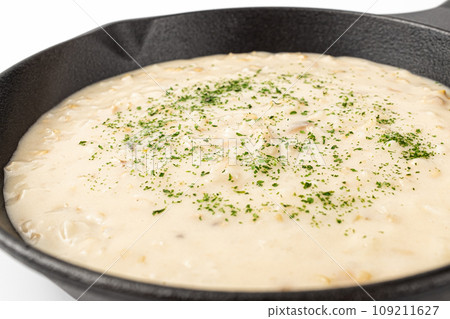 Creamy risotto on a white background 109211627