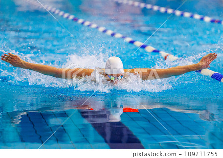 athlete swimmer swim butterfly stroke competition race, summer sports games 109211755