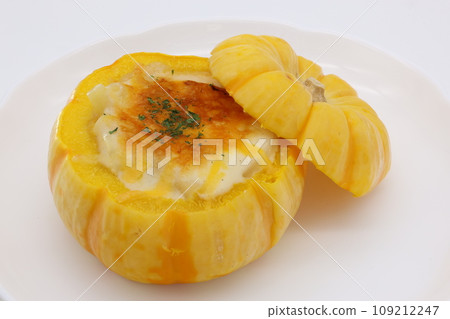 Pumpkin gratin on a white plate 109212247