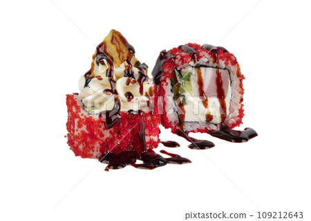 Cheap version of sushi rolls on a white background. Japanese food made from rice and artificial red caviar, eel and Philadelphia cheese topped with soy sauce. 109212643