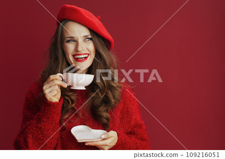 happy stylish 40 years old woman in red sweater and beret happy stylish 40 years old woman in red sweater and beret 109216051