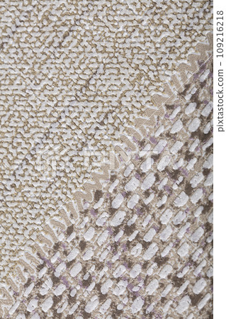 A piece of paper wallpaper with a matting or burlap pattern. Background vertical texture matting. A piece of paper wallpaper with a matting or burlap pattern. Background vertical texture matting. 109216218