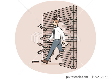 Motivated businessman break wall go for success 109217138