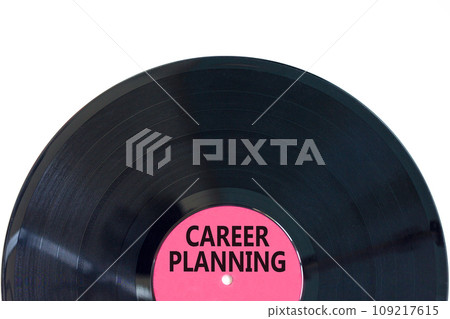 Career planning symbol. Concept words Career planning on beautiful black old retro vinyl disc. Beautiful white table white background. Business, motivational career planning concept. Copy space. 109217615