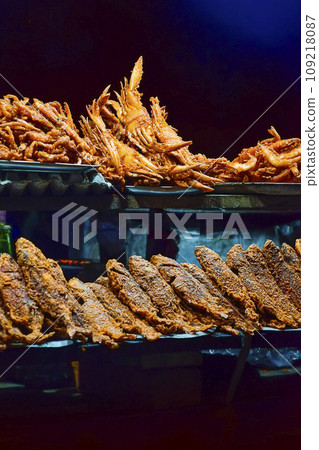 Street food and cuisine made with different types of Ocean fishes, crabs, octopus etc. at the sea beach side of Puri seashore , Odisha, India, Asia 12.02.2020. Street food and cuisine made with different types of Ocean fishes, crabs, octopus etc. at the sea beach side of Puri seashore , Odisha, India, Asia 12.02.2020. 109218087