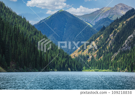 Amazing blue water in Kolsay lake in Kolsai Koldery gorge near Almaty, nature of Kazakhstan National Park, Central Asia Amazing blue water in Kolsay lake in Kolsai Koldery gorge near Almaty, nature of Kazakhstan National Park, Central Asia 109218838
