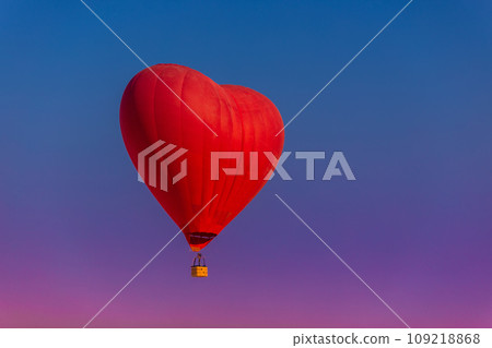 Postcard mockup with copyspace for Valentine's Day with a balloon in the shape of a red heart Postcard mockup with copyspace for Valentine's Day with a balloon in the shape of a red heart 109218868
