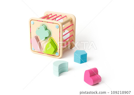 Wooden children's puzzle toy with colorful blocks of different shapes isolated on white background Wooden children's puzzle toy with colorful blocks of different shapes isolated on white background 109218907