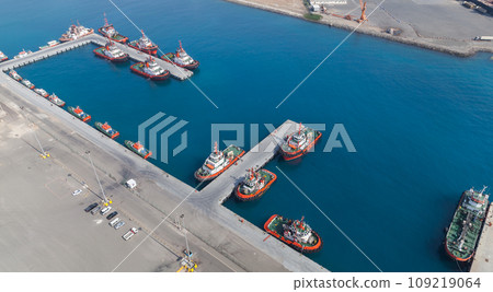 Fleet of tug boats and Pilot boats of Jeddah Islamic Seaport, aerial view Fleet of tug boats and Pilot boats of Jeddah Islamic Seaport, aerial view 109219064