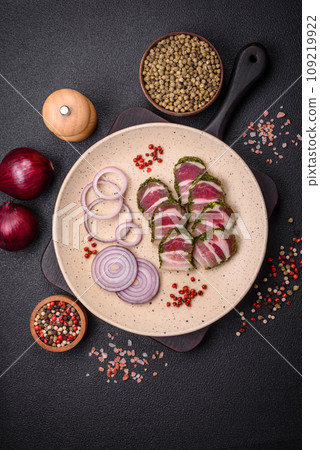 Delicious fresh bacon stripes with spices and salt Delicious fresh bacon stripes with spices and salt 109219922