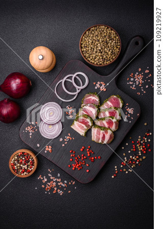 Delicious fresh bacon stripes with spices and salt 109219927