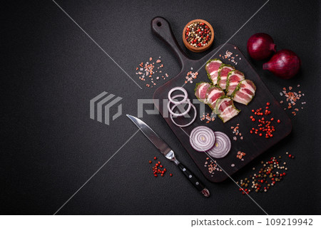 Delicious fresh bacon stripes with spices and salt 109219942