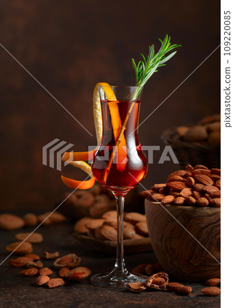 Italian liqueur Amaretto with almonds nuts. Italian liqueur Amaretto with almonds nuts. 109220085