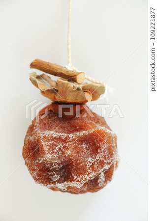 A persimmon A persimmon 109221877