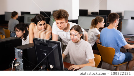 Teenagers using computer during computer science lesson Teenagers using computer during computer science lesson 109222121