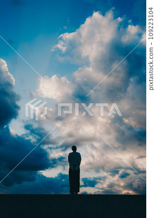 Young woman silhouette photo Young woman silhouette photo 109223104