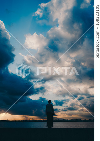 Young woman silhouette photo 109223105