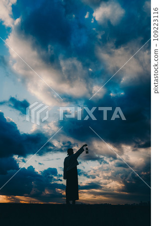 Young woman silhouette photo Young woman silhouette photo 109223116