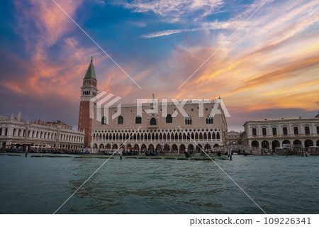 Scenic view of Venice with buildings and boats from the water. No people visible. Predominant color of buildings not specified. No notable landmarks or reflections mentioned. 109226341