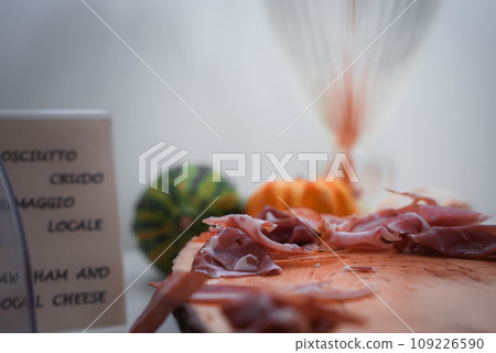 A vibrant and colorful plate of food sits on a rustic wooden table. The simple and straightforward presentation showcases a variety of fresh and delicious ingredients. 109226590
