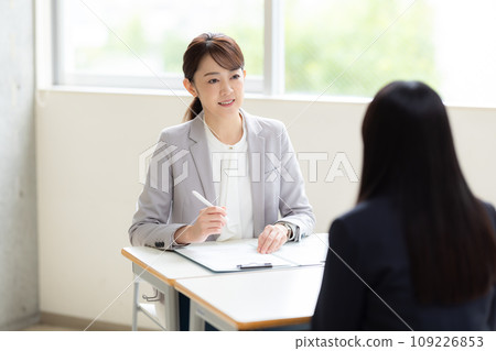 Teacher having an interview Photography cooperation: Ariake College of Education and Arts Teacher having an interview Photography cooperation: Ariake College of Education and Arts 109226853