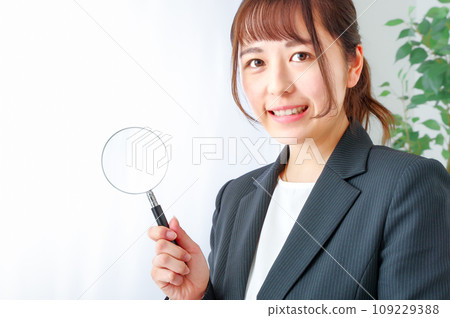 Image of a business person doing research Image of a business person doing research 109229388