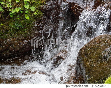 river flowing through rocks river flowing through rocks 109230662