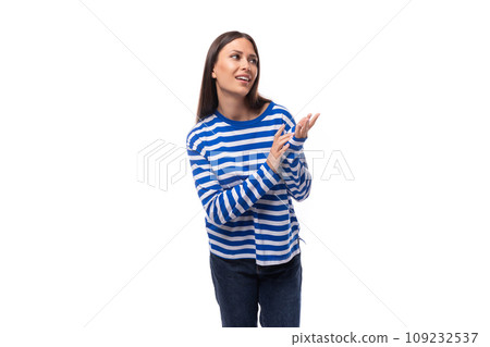 casual urban style. young brunette woman dressed in a stylish cotton striped sweatshirt 109232537